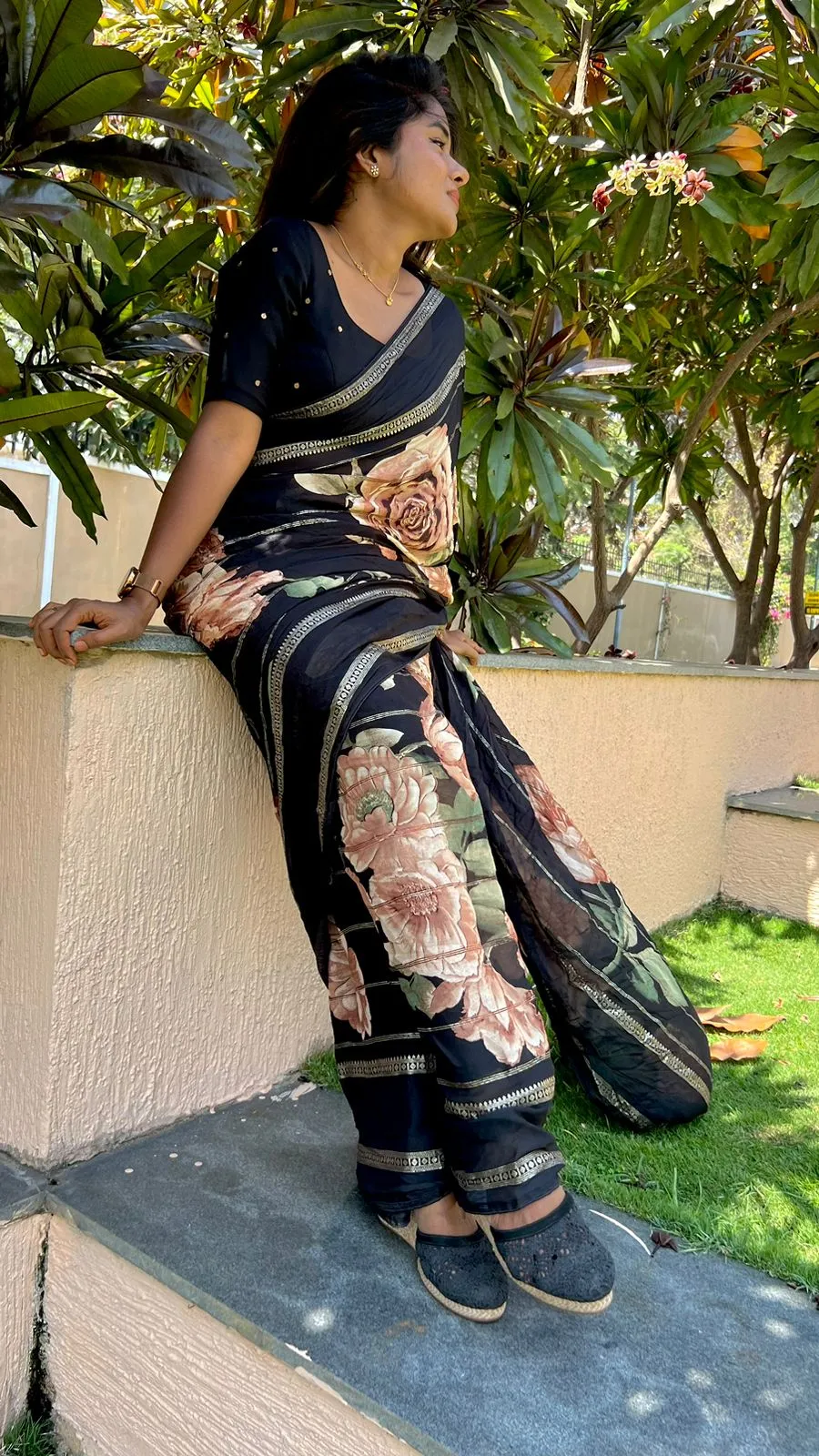 Black chiffon floral saree with handworked blouse