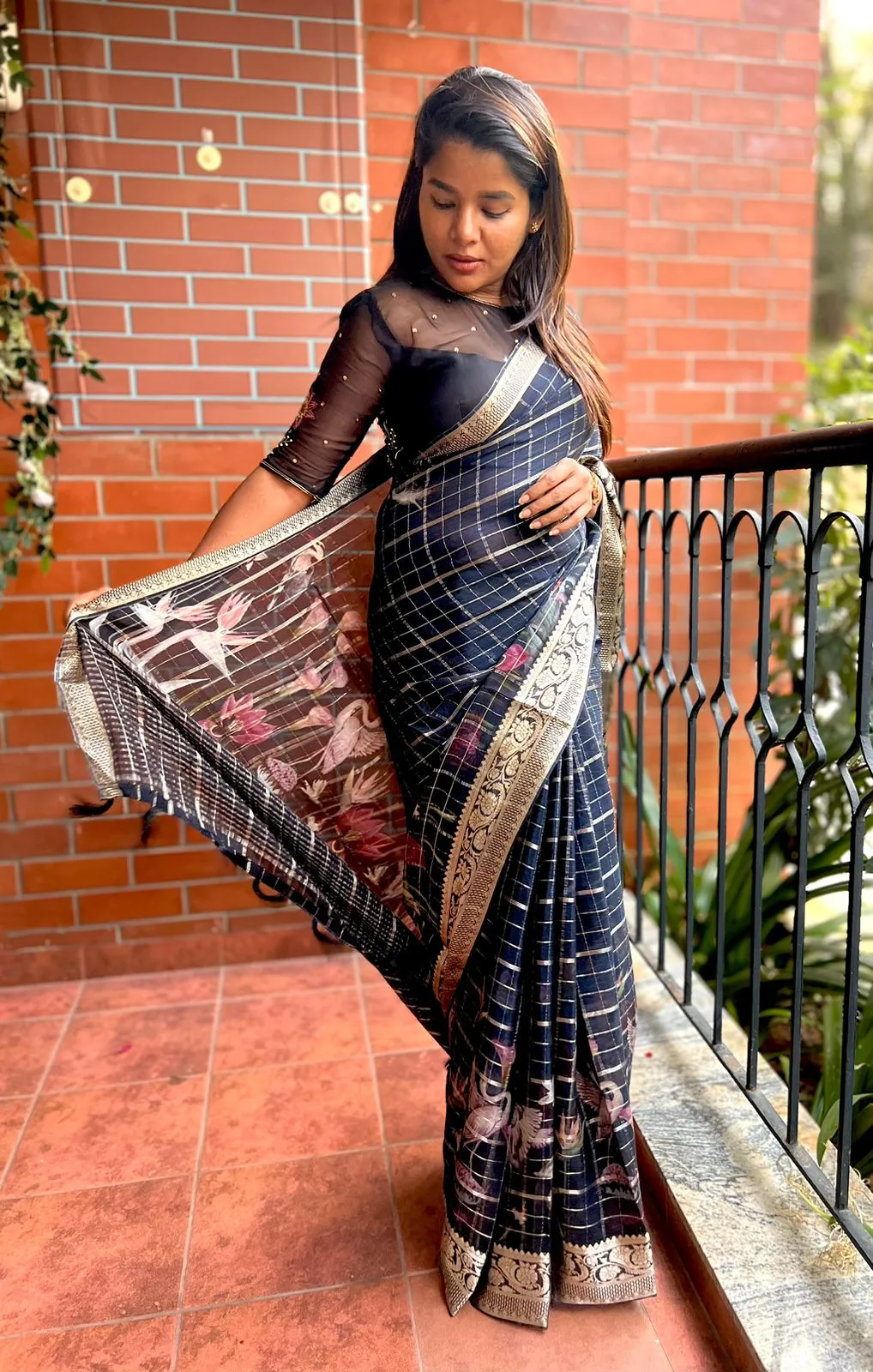 Black floral chiffon saree with black hand worked blouse